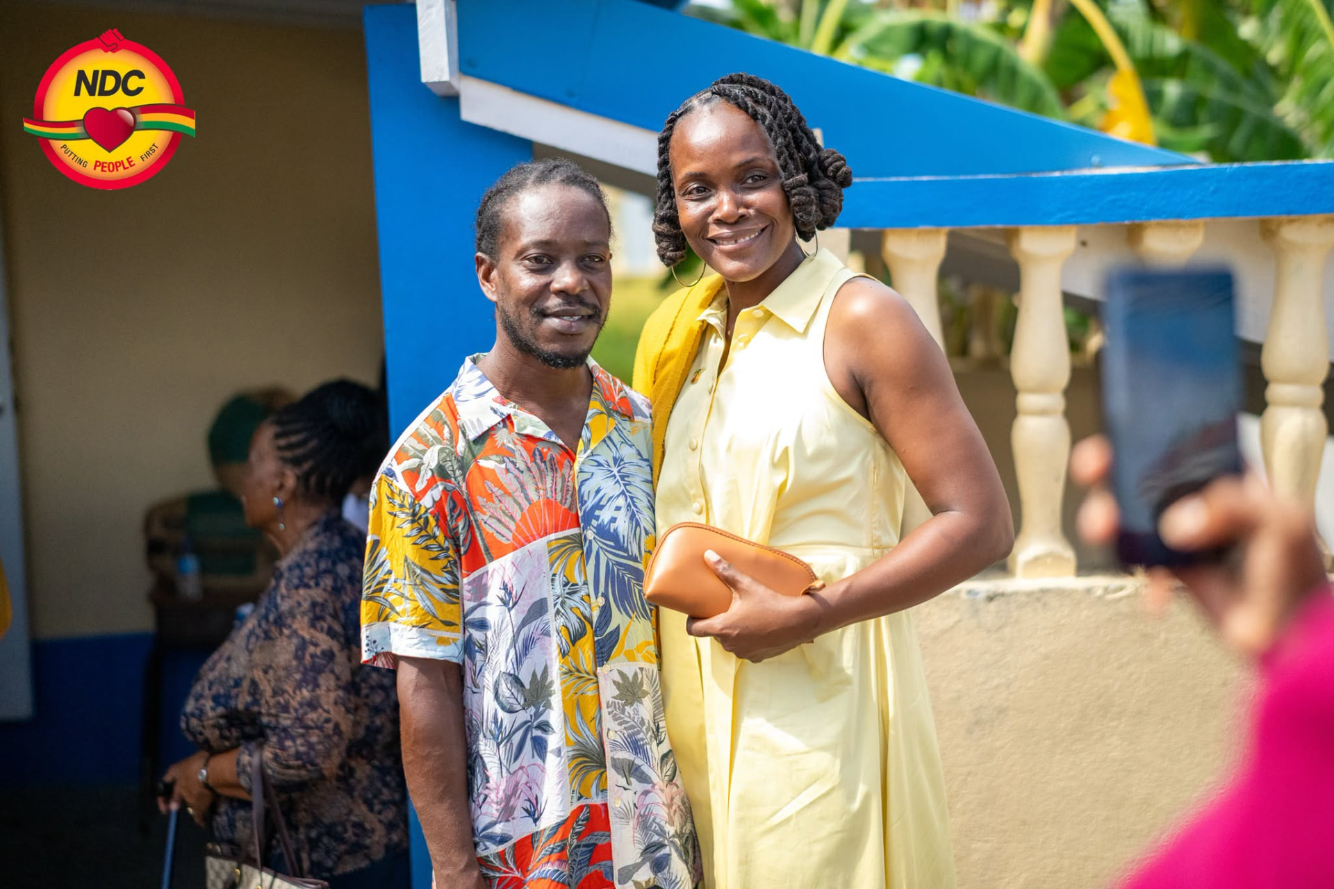 Caris DeGannes posing for a photo with a resident